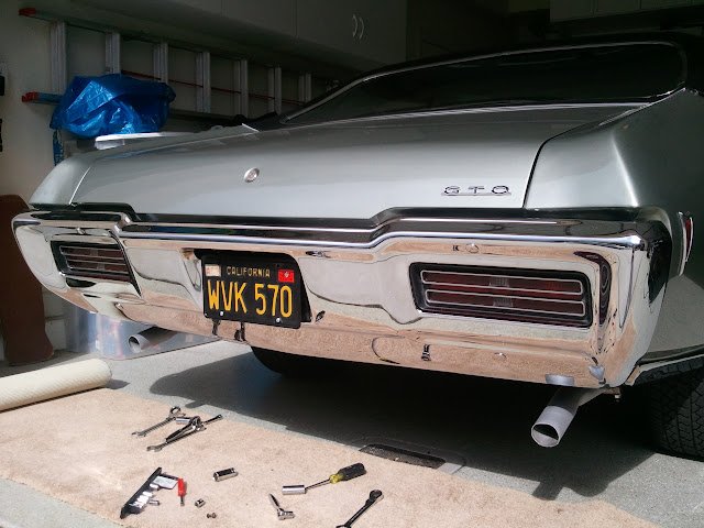 68 GTO bumper with fresh chrome re-plating and fresh tailpipe paint 